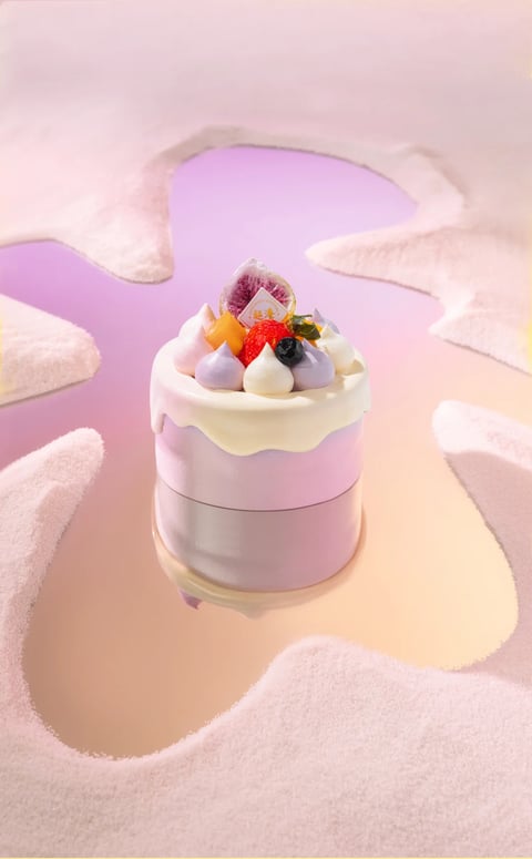 The image presents a photorealistic, 3D-rendered style reference for a whimsical, dessert-focused moodboard, characterized by a soft, dreamlike aesthetic. The color language is dominated by a pastel palette of lavender, blush pink, and creamy white, with high saturation in the vibrant fruit toppings (red strawberry, deep blue blueberry, purple fig slice) creating focal points against the muted background. Lighting is soft and diffused, emanating from an indeterminate, gentle source that casts subtle, warm-toned reflections on the glossy, mirrored surface beneath the cake, enhancing the ethereal mood. Texture and material feel are meticulously rendered: the cake's sides show a smooth, matte finish with a glossy white drip glaze, the toppings feature realistic fruit skins and glossy meringue dollops, and the surrounding environment has a fine, granular, sugar-like texture. Compositionally, the cake is centrally framed with a shallow depth of field, surrounded by abstract, organic cutouts in the textured foreground that lead the eye inward, creating a sense of depth and enclosure. Shape language blends organic forms (rounded meringue peaks, fruit shapes, irregular cutout edges) with geometric precision (the cylindrical cake tiers), all rendered with soft, blurred edges. The overall mood is serene, playful, and indulgent, with a light, airy energy and a focus on delicate, tactile details.