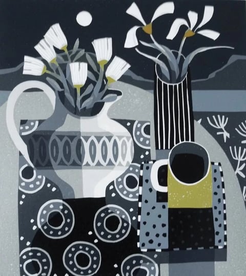This image presents a stylized, illustrative still life rendered in a flat, graphic aesthetic with a strong emphasis on pattern and shape. The color language is predominantly monochromatic, utilizing a sophisticated palette of cool grays, deep charcoals, and crisp whites, punctuated by strategic accents of muted mustard yellow and olive green. The lighting is flat and graphic, lacking realistic gradation or shadow, which reinforces the illustrative quality and focuses attention on form and pattern. Textures are rendered through graphic patterns rather than realistic surface detail; surfaces appear smooth and matte, with visual interest created by repeating motifs like concentric circles, dots, and stripes. The composition is tightly framed and layered, arranging objects—a patterned pitcher, a tall striped vase, and a small cup on a tray—on overlapping patterned surfaces, creating a shallow, collage-like depth. Shape language is a deliberate mix of organic forms (the flowers, pitcher curves) and strong geometric elements (stripes, circles, rectangular tray), all defined by clean, crisp edges and uniform line weight. The overall mood is calm, orderly, and decorative, with a quiet, graphic energy derived from the rhythmic repetition of shapes and the restrained, harmonious color scheme.