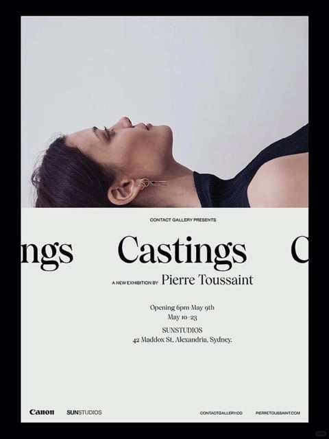 The image exhibits a minimalist, high-fashion editorial aesthetic with a photorealistic rendering technique. The color language is dominated by a muted, desaturated palette featuring cool off-whites, deep navy blues, and soft, natural skin tones, with low saturation and high contrast between the subject and the clean background. Lighting is soft and diffused, appearing to come from above and slightly behind the subject, creating gentle gradients on the skin and subtle shadows that define the jawline and neck without harshness, conveying a serene and contemplative mood. Texture and material feel are rendered with fine detail, emphasizing the smoothness of skin, the delicate metallic sheen of the earring, and the fine ribbed knit of the navy garment. The composition is asymmetrical and cropped, focusing on a close-up profile of a woman's head and neck tilted back, with significant negative space above and to the left, creating a sense of openness and depth. Shape language is organic, centered on the curved lines of the face, neck, and hair, with clean, sharp edges where the photographic image meets the graphic text block below. The overall mood and atmosphere are calm, sophisticated, and slightly ethereal, with a low-energy, introspective visual weight.