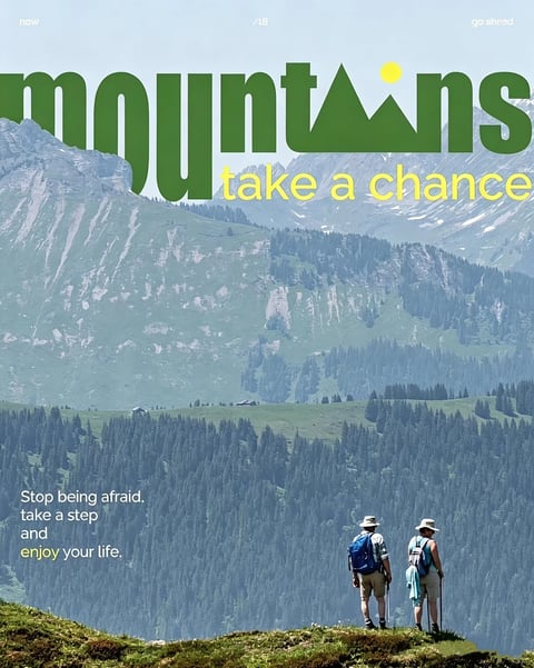 The image is a photorealistic, landscape-oriented promotional poster with a vertical composition that layers a majestic alpine scene with bold typographic elements. The main subject features two hikers, a man and a woman, viewed from behind as they stand on a grassy, moss-covered ridge in the lower right foreground, gazing into a vast mountain valley. The man wears a blue backpack, khaki shorts, a plaid shirt, and a wide-brimmed hat, while the woman wears a light blue backpack, shorts, a tank top, and a similar hat, both holding trekking poles. The middle ground is dominated by a dense, dark green coniferous forest that blankets the lower slopes, transitioning into lighter green alpine meadows with a few scattered wooden cabins in the distance. The background is filled with towering, rugged mountain peaks under a clear, pale blue sky, with the nearest peaks showing detailed rock faces and patches of snow. The visual aesthetic is realistic photography with a vibrant, high-contrast color palette; the dominant colors are deep forest greens, earthy browns, and cool mountain blues, punctuated by the bright yellow of the text and a small sun icon. The lighting is bright, directional daylight, casting soft shadows and creating a clear, crisp atmosphere with a sense of expansive depth. Texture is highly detailed, from the rough, rocky mountain surfaces and soft grassy foreground to the dense, bristly texture of the pine trees. The composition uses a layered depth of field, with the hikers providing a human scale against the immense landscape, and the text is integrated as a major graphic element. Large, bold green text reading "mountains" spans the top, with the 'i' replaced by a stylized mountain peak and a yellow sun dot; below it, the phrase "take a chance" appears in bright yellow lowercase letters. In the upper corners, small white text reads "now" (left), "/18" (center), and "go ahead" (right). In the lower left, additional white and yellow text states: "Stop being afraid. take a step and enjoy your life." The shape language is primarily organic, featuring the natural, irregular forms of mountains and trees, contrasted with the clean, geometric lines of the bold, sans-serif typography. The overall mood is adventurous, inspirational, and serene, evoking a sense of freedom and the call to explore nature.
