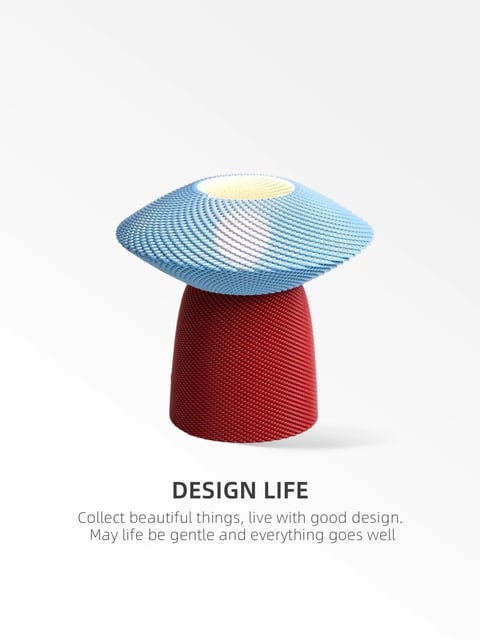 The image presents a single, stylized mushroom-shaped object centered against a clean, off-white background, rendered in a soft, illustrative 3D style that emphasizes tactile textures. The object features a rounded, conical red base and a wide, mushroom-cap top that transitions from a deep blue at the edges to a bright, sunlit yellow center, all composed of a detailed, woven or knitted fabric-like texture with visible horizontal ridges and soft highlights. Below the object, centered text in a modern, dark sans-serif font reads 'DESIGN LIFE' followed by the two lines 'Collect beautiful things, live with good design. / May life be gentle and everything goes well' in a lighter gray font, adding a poetic, lifestyle-oriented context. The lighting is soft and diffuse, casting gentle shadows beneath the object to ground it, while the color palette is defined by high-saturation primary red and blue against the neutral background, creating a cheerful, contemporary, and whimsical mood focused on design aesthetics and gentle living.