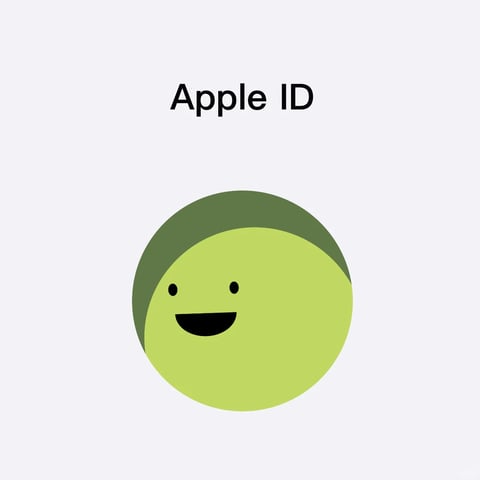 The image features a minimalist, flat design composition centered on a single stylized emoji-like character against a solid off-white background. The main subject is a circular face, split into two distinct color zones: a dark olive green upper portion resembling hair or a cap, and a light yellow-green lower portion forming the face itself. The face has simple black features—two small dot eyes and a wide, smiling semi-circular mouth—rendered in a clean, vector-illustrative style with sharp edges and no gradients or textures. Above the character, centered in the upper third of the frame, is the text 'Apple ID' in a clean, black sans-serif typeface, serving as a clear title or label. The overall visual aesthetic is extremely flat and graphic, using a limited, muted color palette dominated by two shades of green with high contrast against the pale background. The lighting is uniform and shadowless, reinforcing the 2D, illustrative quality. The composition is symmetrical and balanced, with the circular character anchored centrally below the text, creating a simple, approachable, and modern mood with a friendly, cheerful tone conveyed by the smiling expression.