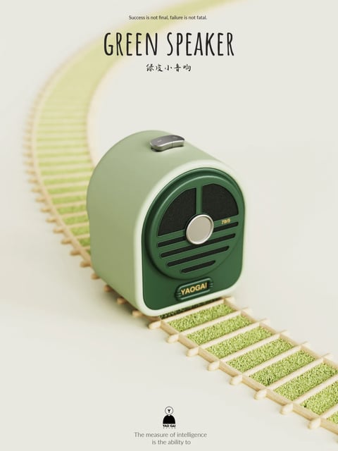 The image presents a stylized product photograph of a portable speaker designed to evoke a retro train engine, set against a minimalist, off-white background. The main subject is a rounded, capsule-shaped speaker in two-tone sage and forest green, positioned on a curved, miniature wooden railroad track that extends from the lower right into the blurred upper left, creating a diagonal compositional line and a sense of depth. The speaker's front features a circular speaker grille with concentric rings and a central metallic knob, flanked by horizontal slats, with the brand name 'YAOGAI' and the number '79/5' subtly integrated. The top has a single, elongated metallic button. Visible text includes the English phrase 'Success is not final, failure is not fatal.' at the top, the large title 'GREEN SPEAKER' and its Chinese translation '绿皮小音响' below it, a small 'YAOGAI' logo at the bottom, and the partial sentence 'The measure of intelligence is the ability to' beneath the logo. The visual aesthetic is a clean, photorealistic 3D render with a soft, product-focused quality. The color language is dominated by a muted, earthy palette of sage green, forest green, warm beige for the track, and metallic silver accents, with low saturation and gentle contrast. The lighting is soft and diffuse, coming from the upper left, casting subtle shadows that define the speaker's curved form without harshness. Texture and material are rendered with a smooth, matte plastic finish on the speaker body, a fine metallic mesh on the grille, and a tactile, fibrous green material filling the railroad ties. The composition uses a shallow depth of field, keeping the speaker and immediate track in sharp focus while the background track and text softly blur. Shape language combines the organic, rounded curves of the speaker with the geometric, linear patterns of the track and grille. The mood is calm, nostalgic, and whimsical, with a low-energy, focused atmosphere.