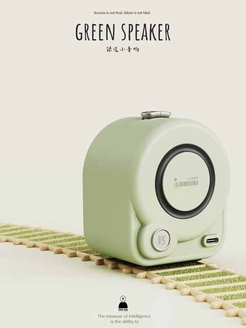 This is a photorealistic 3D rendered product visualization featuring a compact, rounded speaker as the central subject. The speaker, rendered in a soft, muted sage green, sits centered on a textured mat made of light wooden slats interspersed with patches of artificial green grass, creating a natural yet stylized base. The composition is clean and minimalist with ample negative space, placing the speaker against a smooth, neutral off-white background that subtly transitions in tone. Visible text appears at the top: "Success is not final, failure is not fatal." in a small sans-serif font, followed by the large, bold title "GREEN SPEAKER" and the Chinese characters "绿皮小音响" below it. At the bottom, a small logo with the text "YAO GAI" is present, along with the phrase "The measure of intelligence is the ability to" in a delicate serif font. The speaker's design features soft, organic curves with a prominent circular front element bordered by a black ring, a metallic silver control knob at the bottom left, a USB-C port on the bottom right, and a small metallic detail on top. The lighting is soft and diffused, coming from the upper left, casting gentle shadows that define the speaker's rounded form without harsh contrast. The overall color palette is restrained, dominated by the sage green of the speaker, the natural wood and green of the mat, and the neutral background, creating a calm, modern, and slightly playful aesthetic with a focus on clean product design and material realism.