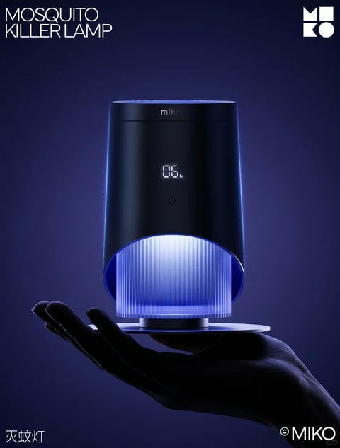 This is a sleek, modern product photograph centered on a cylindrical, dark blue or black Mosquito Killer Lamp held in a silhouetted human hand against a deep, gradient blue background. The composition is vertical and minimalist, with the product positioned slightly off-center, its base resting on a thin, circular plate within the palm. The lamp features a smooth, matte upper body with a digital display showing "06." and a small power icon below, and a lower section with vertical ridges that emit a bright, cool blue-white glow, creating a strong focal point. Visible text includes "MOSQUITO KILLER LAMP" in large, white, sans-serif capital letters at the top left, the brand name "miko" in smaller white letters on the upper body of the lamp, the Chinese characters "灭蚊灯" (meaning mosquito killer lamp) in white at the bottom left, and a "© MIKO" copyright mark in white at the bottom right. The visual aesthetic is high-end and technological, rendered with photorealistic clarity and a slight 3D product visualization quality. The color language is dominated by a monochromatic palette of deep, saturated blues and black, punctuated by the intense, cool blue-white light from the lamp, creating high contrast and a modern, cool temperature. Lighting is dramatic and directional, with the primary source appearing to be the lamp's own internal glow, which casts soft light onto the hand and creates subtle highlights on the product's edges, conveying a moody, high-tech atmosphere. Texture and material rendering emphasize smooth, matte finishes on the upper body and the precise, linear texture of the illuminated ridged section, with a tactile sense of polished plastic or metal. The composition uses negative space effectively, with the hand providing scale and a sense of interaction, while the depth is shallow, focusing attention sharply on the product. Shape language is predominantly geometric and clean, with cylindrical forms, circular bases, and straight vertical lines, softened by the organic curve of the hand. The overall mood is sophisticated, efficient, and slightly futuristic, with a calm yet potent energy focused on the product's function.