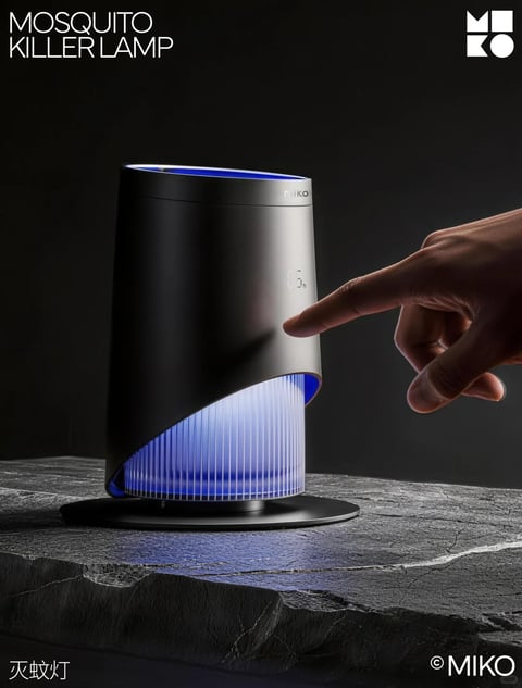 The image features a sleek, modern mosquito killer lamp as the main subject, presented in a photorealistic, high-contrast studio setting against a dark, textured slate surface and a gradient black background. The composition is tightly framed, centering the cylindrical, matte black device with a diagonal cutaway revealing an inner grid illuminated by a cool, vibrant blue light. A human hand enters from the right, with an index finger touching the device's smooth surface near a faint, glowing digital display showing '0.6h'. Visible text includes 'MOSQUITO KILLER LAMP' in a clean, white sans-serif font at the top left, the brand name 'MIKO' in a stylized white logo at the top right and bottom right, and the Chinese characters '灭蚊灯' (meaning 'mosquito killer lamp') in white at the bottom left. The lighting is dramatic and directional, casting soft shadows to emphasize the lamp's sculptural form and the tactile contrast between the smooth metal casing and the rough stone base. The color palette is dominated by deep blacks and charcoal grays, punctuated by the intense, saturated blue glow from the lamp's interior, creating a high-tech, sophisticated, and slightly mysterious atmosphere with a focus on clean geometric shapes and a minimalist aesthetic.