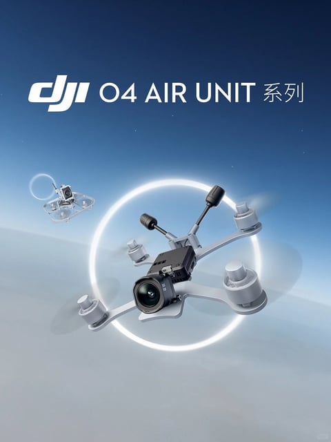 The image showcases two custom FPV drones against a gradient blue-to-white background, with the larger drone centered in the foreground and a smaller, caged drone in the upper left background. The primary drone is a lightweight, metallic silver quadcopter with a black central module housing a prominent camera lens, and two black antennas extending upward; its propellers are in motion, creating blurred motion trails. A bright, glowing white circular ring surrounds the central drone, emphasizing its form. The scene is rendered in a photorealistic 3D style with a clean, high-tech aesthetic. The color palette is dominated by cool tones: the deep blue of the upper background fades to a soft white below, with the silver and black of the drones providing contrast. Lighting is soft and directional, emanating from the glowing ring, casting subtle shadows and highlighting the drones' metallic and matte textures, creating a futuristic, ethereal mood. Compositionally, the larger drone is framed centrally with a dynamic diagonal orientation, while the smaller drone in the background adds depth and context. The image features clear, bold white text in the upper portion: 'DJI' in its stylized logo font, followed by 'O4 AIR UNIT 系列' in a sans-serif typeface, where '系列' is Chinese for 'series,' indicating the product name and brand. The overall texture combines smooth metallic finishes on the drone arms and camera module with softer, blurred motion effects on the propellers and the ethereal glow of the light ring.