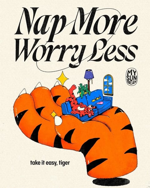 The image presents a cohesive, illustrative composition centered on a stylized, oversized orange tiger paw cradling a miniature living room scene. The paw, rendered with bold black stripes and white claws, dominates the foreground with a soft, rounded shape and a tactile, slightly grainy texture. Nestled within its palm is a vibrant blue sofa where two red, cartoonish tiger-like figures lounge playfully, one sticking out its tongue. The miniature scene includes a purple floor lamp with a blue shade, a green potted plant, and a small arched window showing a bright blue sky with clouds. The background is a textured, off-white canvas that enhances the illustrative feel. Prominent black serif text at the top reads 'Nap More Worry Less' in a decorative, slightly swashed script, with 'take it easy, tiger' in a smaller, simpler sans-serif font below the paw. A circular 'MY SUN BEAM' logo appears in the upper right. The overall visual aesthetic is flat yet layered, with a warm, saturated color palette dominated by orange, blue, and red, set against a neutral backdrop. The lighting is even and soft, casting gentle shadows that give the objects dimensionality without harsh contrasts. The mood is playful, relaxed, and whimsical, conveyed through the exaggerated shapes, vibrant colors, and the cozy, contained composition of the miniature scene within the protective paw.