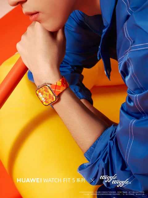 A close-up lifestyle photograph captures a person's arm and hand resting near their chin, showcasing a Huawei Watch Fit 5 series smartwatch. The composition centers on the wrist adorned with a rectangular smartwatch featuring a rose-gold toned metallic frame with rounded corners and a vibrant orange and yellow checkered fabric strap with subtle diagonal line details. The watch face displays a colorful geometric dial in warm yellow, orange, and red tones with a stylized character illustration and digital time reading 10:09. The person wears a cobalt blue windbreaker jacket with visible white contrast stitching and a half-zip collar. The background consists of a curved yellow surface with an orange accent edge, creating a bold, graphic color palette. Text at the bottom left reads 'HUAWEI WATCH FIT 5 系列' in white sans-serif lettering, with 'wiggle wiggle' in a playful script font to the right, separated by an X symbol indicating a collaboration. Small disclaimer text appears in the lower right corner in Chinese characters. The overall style is contemporary and youthful with a strong emphasis on color blocking and fashion-forward styling.
