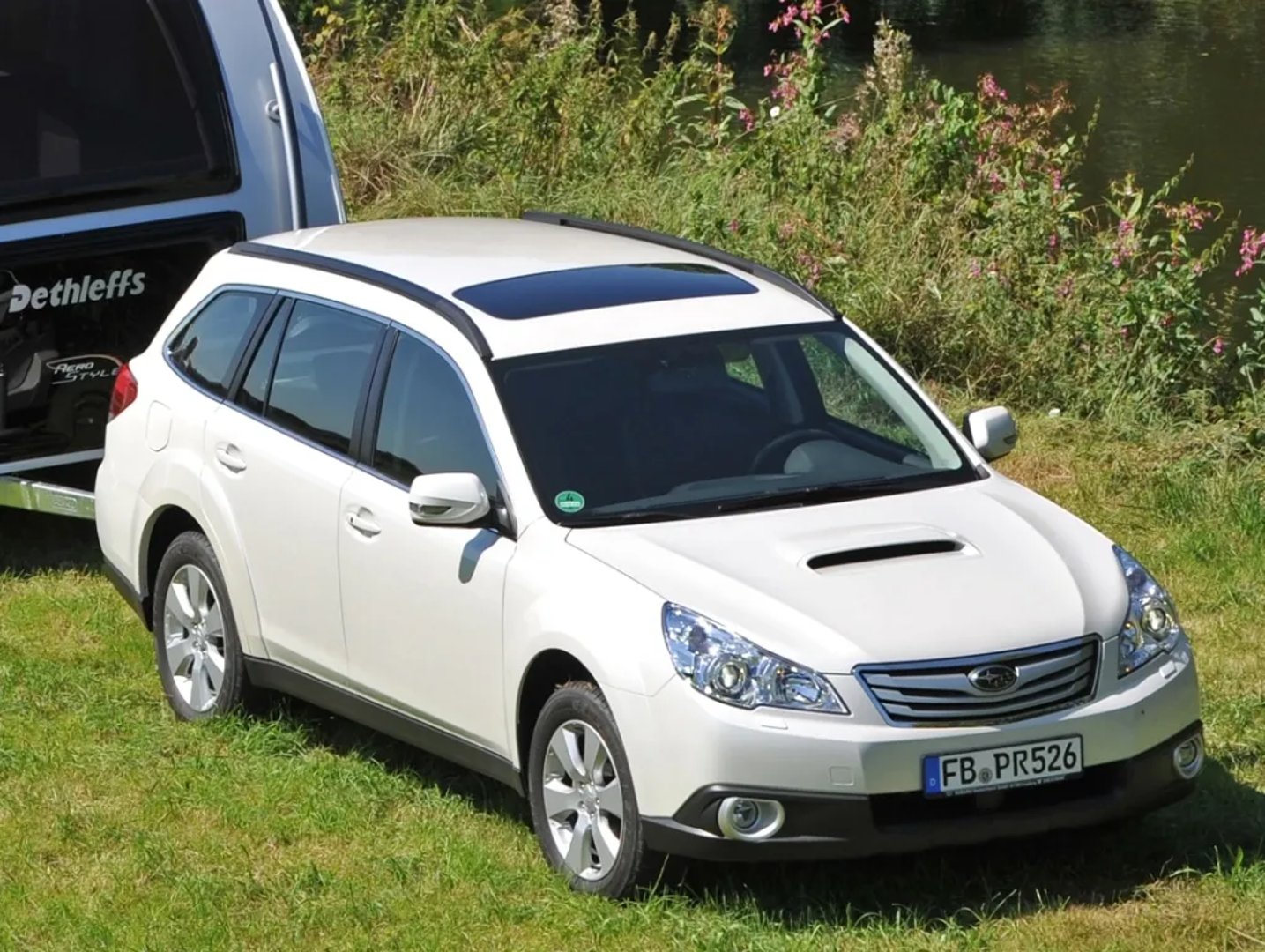 Subaru_Outback_4_generation__Estate_5-door__1.jpg