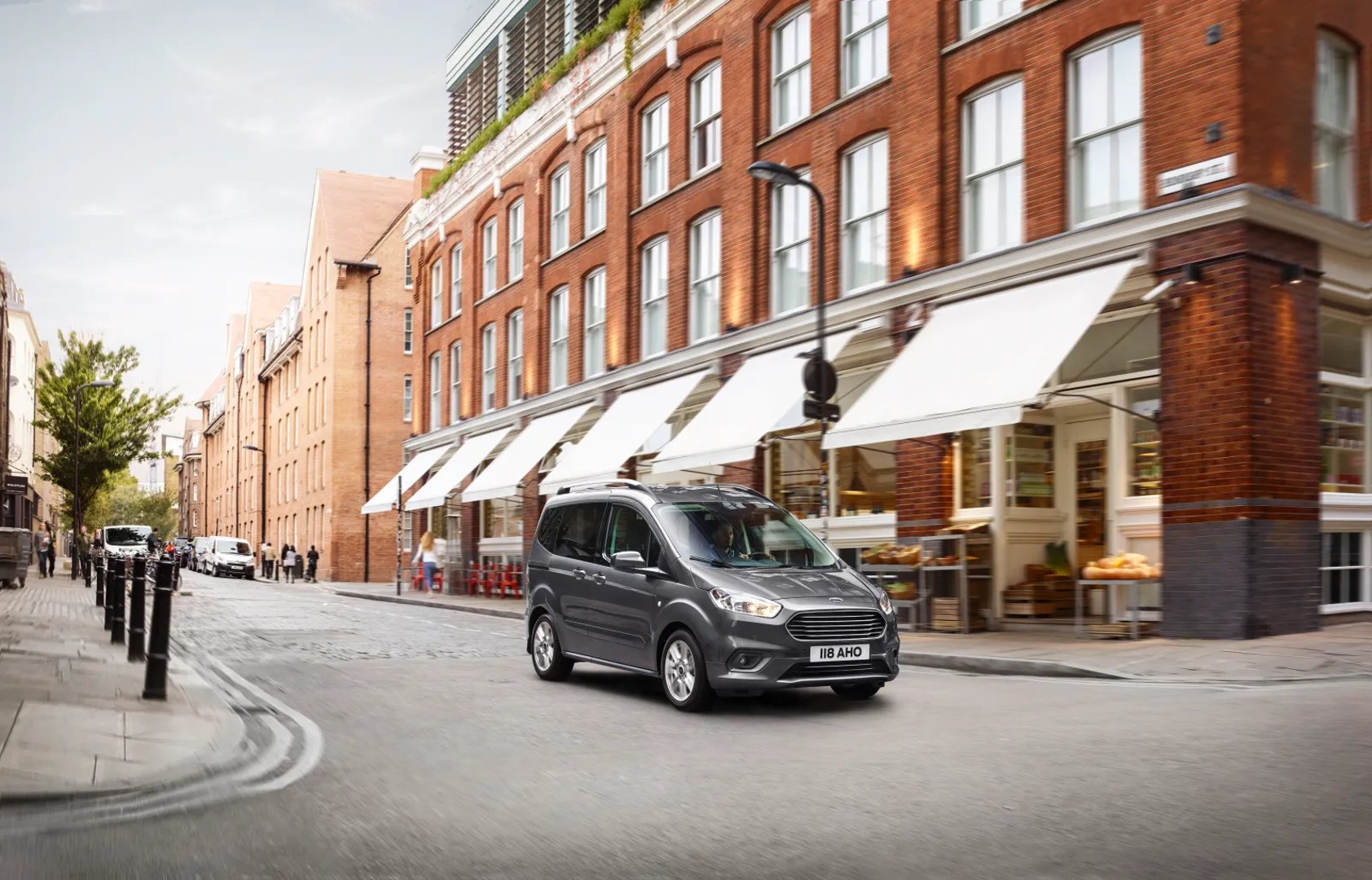 Ford_Tourneo_Courier_1_generation_restyling__Compact_Van__1.jpg