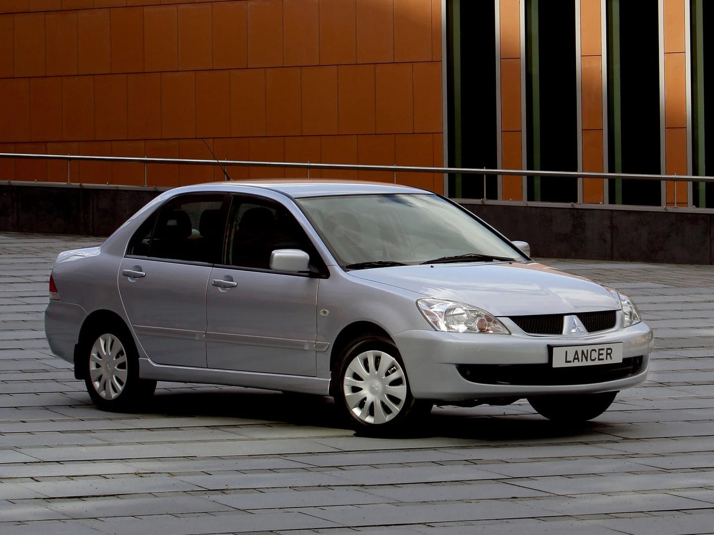 Mitsubishi_Lancer_9_generation_restyling__Sedan__11.jpg