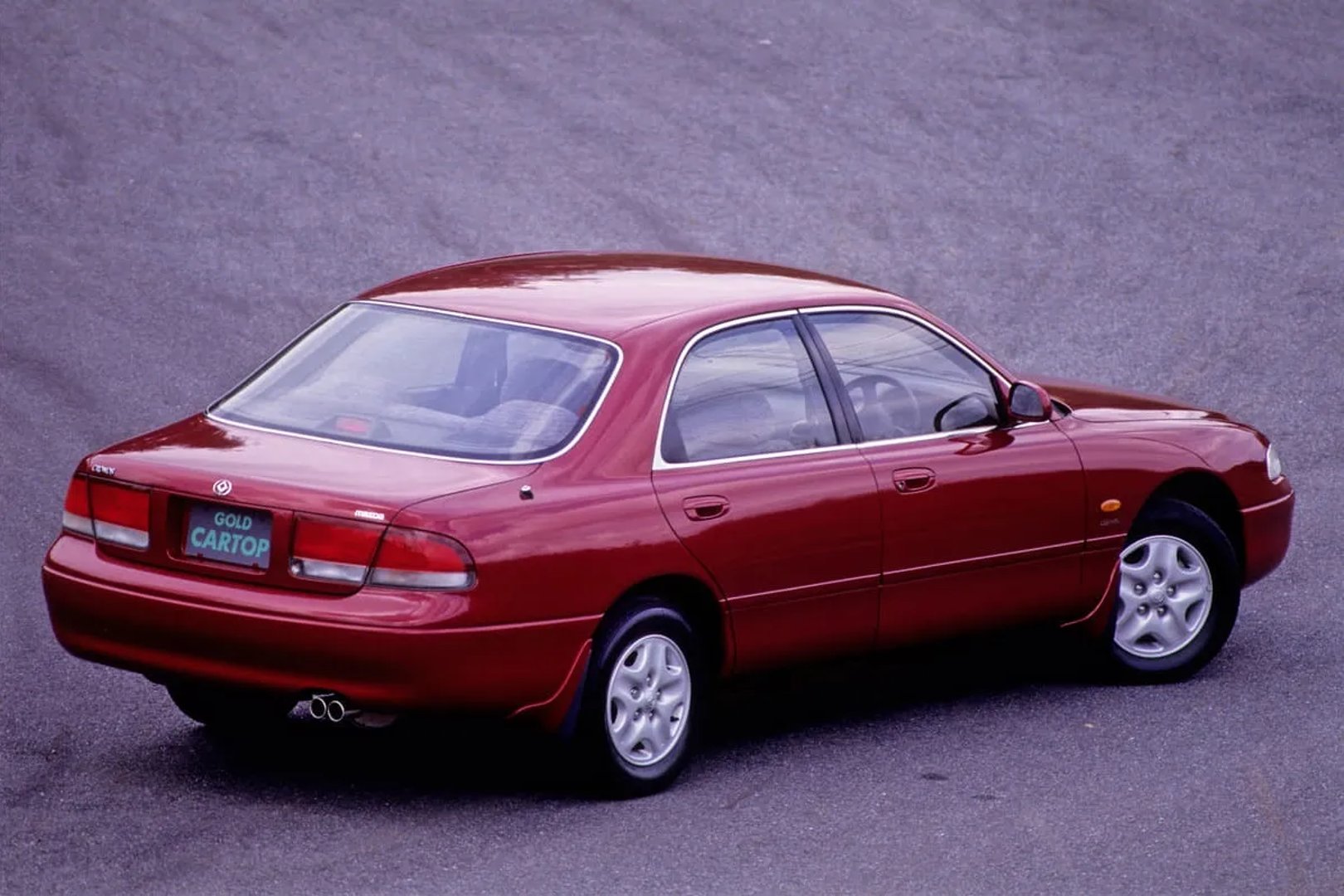 Mazda_Cronos_1_generation__Sedan__1.jpg