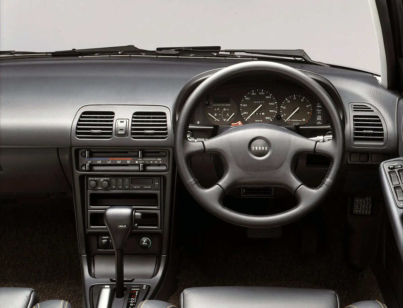 Mazda_Eunos_100_1_generation__Hatchback_5-door__3.jpg
