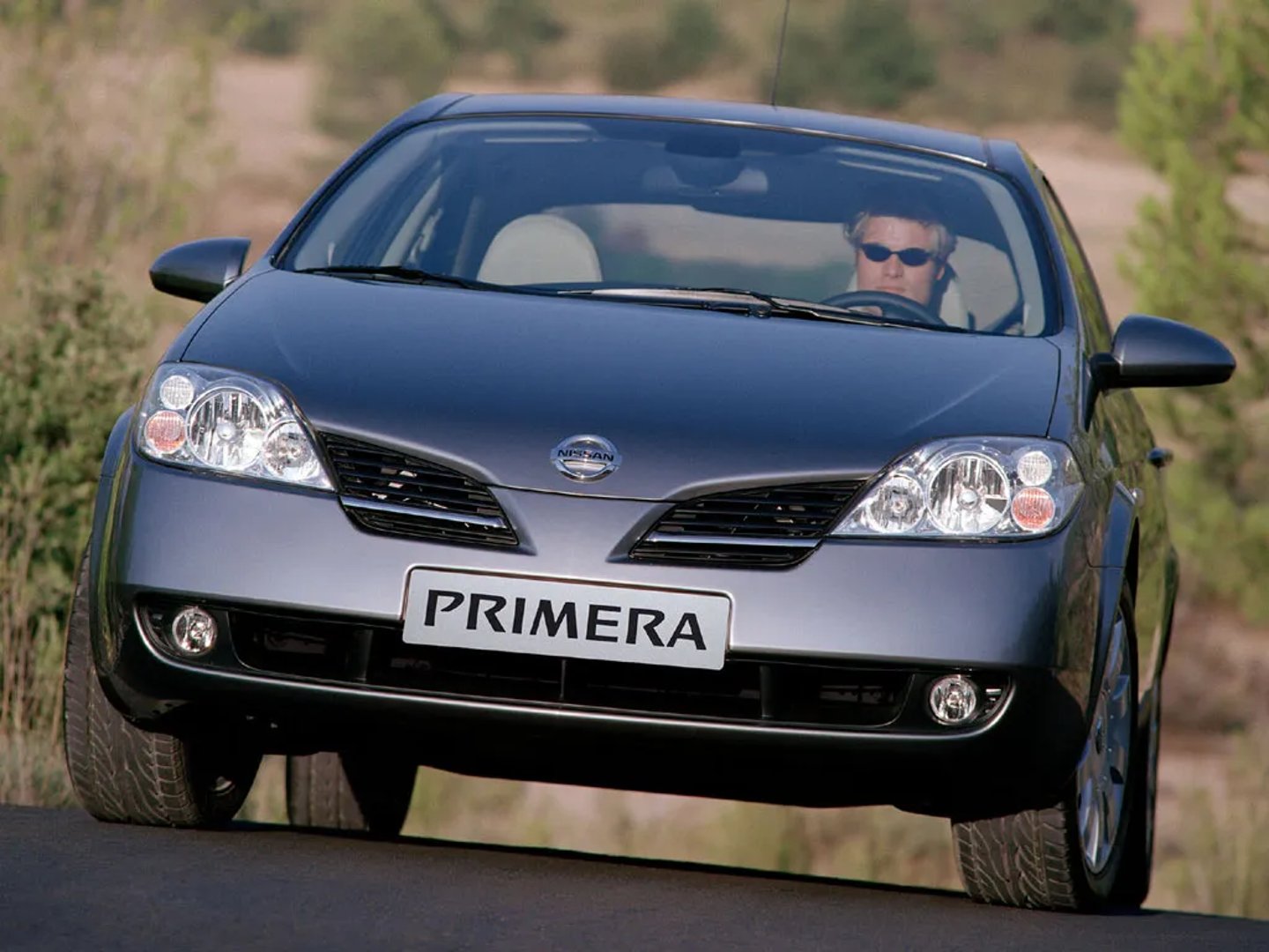 Nissan_Primera_3_generation__Hatchback_5-door__1.jpg