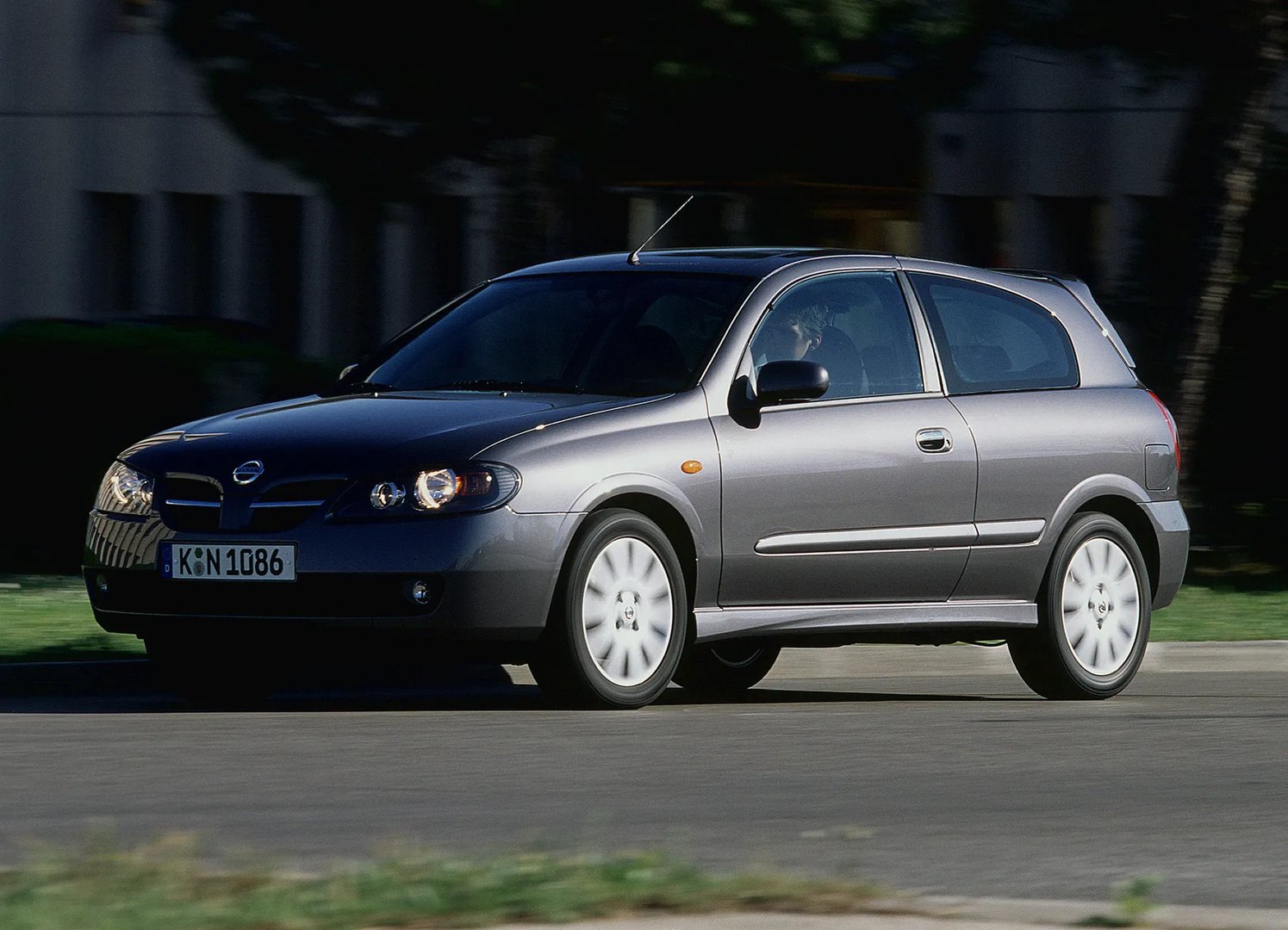 Nissan_Almera_2_generation_restyling__Hatchback_3-door__13.jpg