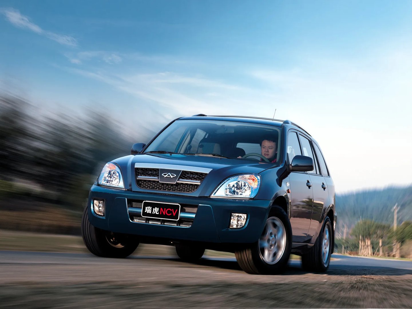 Chery_Tiggo_(T11)_1_generation__SUV_5-doors__4.jpg