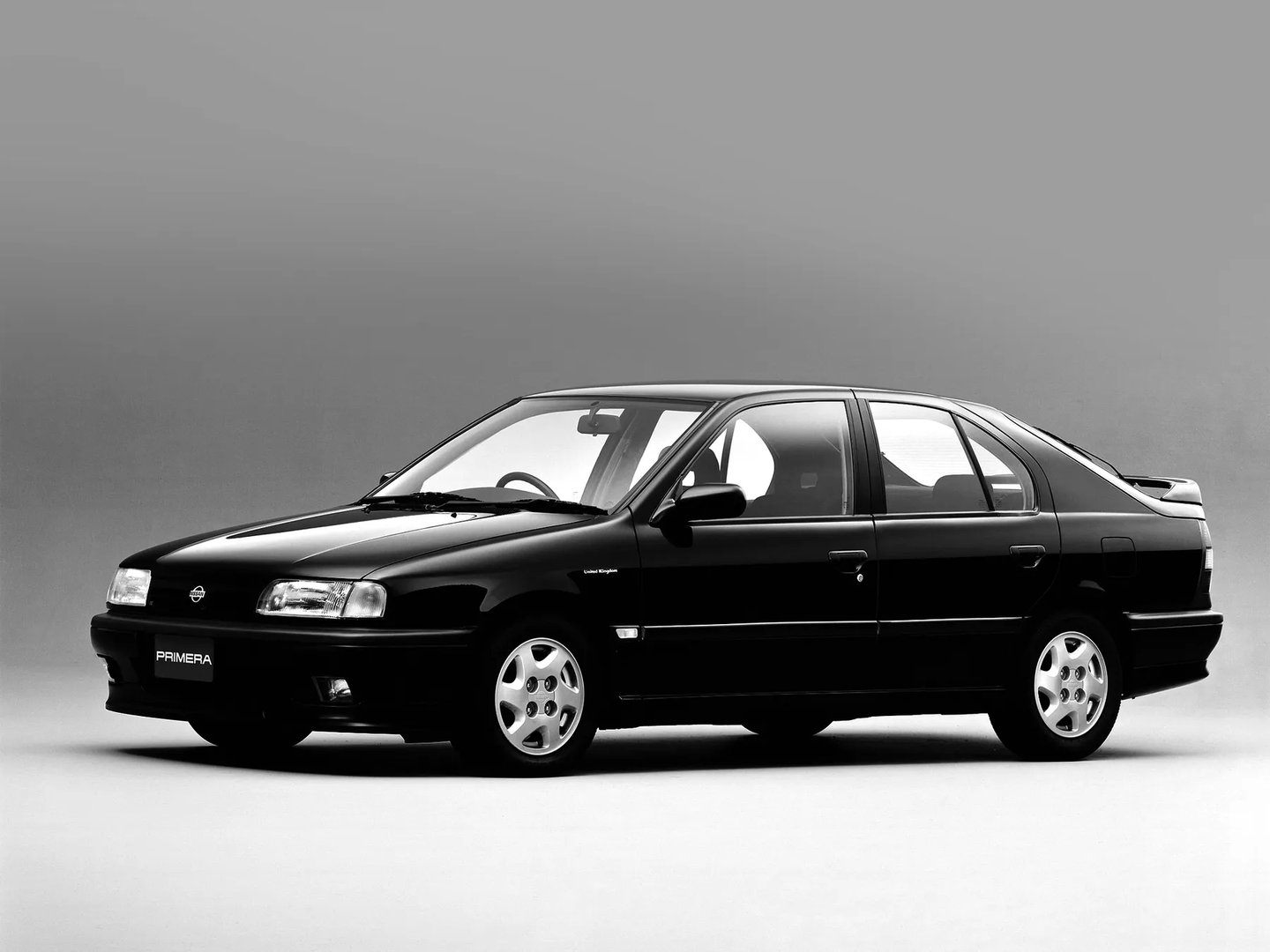 Nissan_Primera_1_generation__Hatchback_5-door__2.jpg