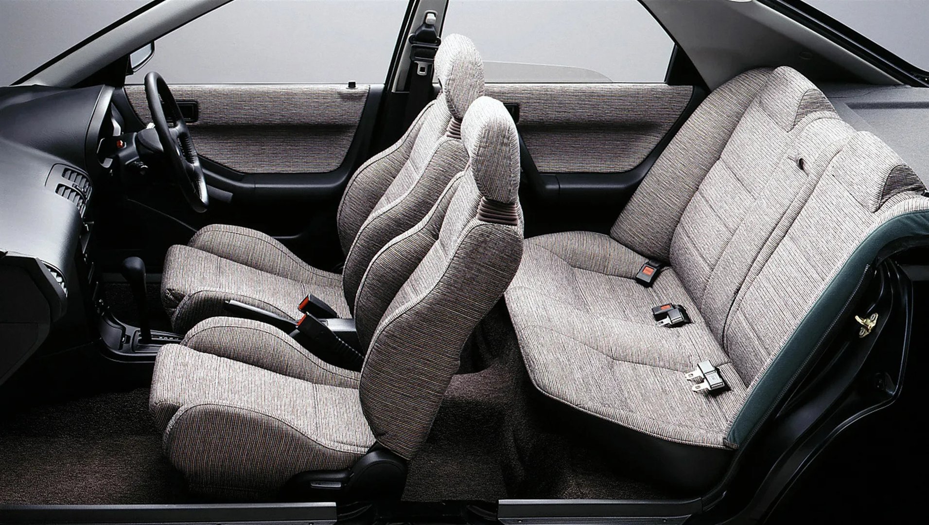 Mazda_Eunos_100_1_generation__Hatchback_5-door__4.jpg