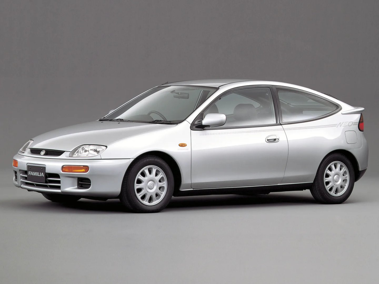 Mazda_Familia_8_generation__Hatchback_3-door__2.jpg
