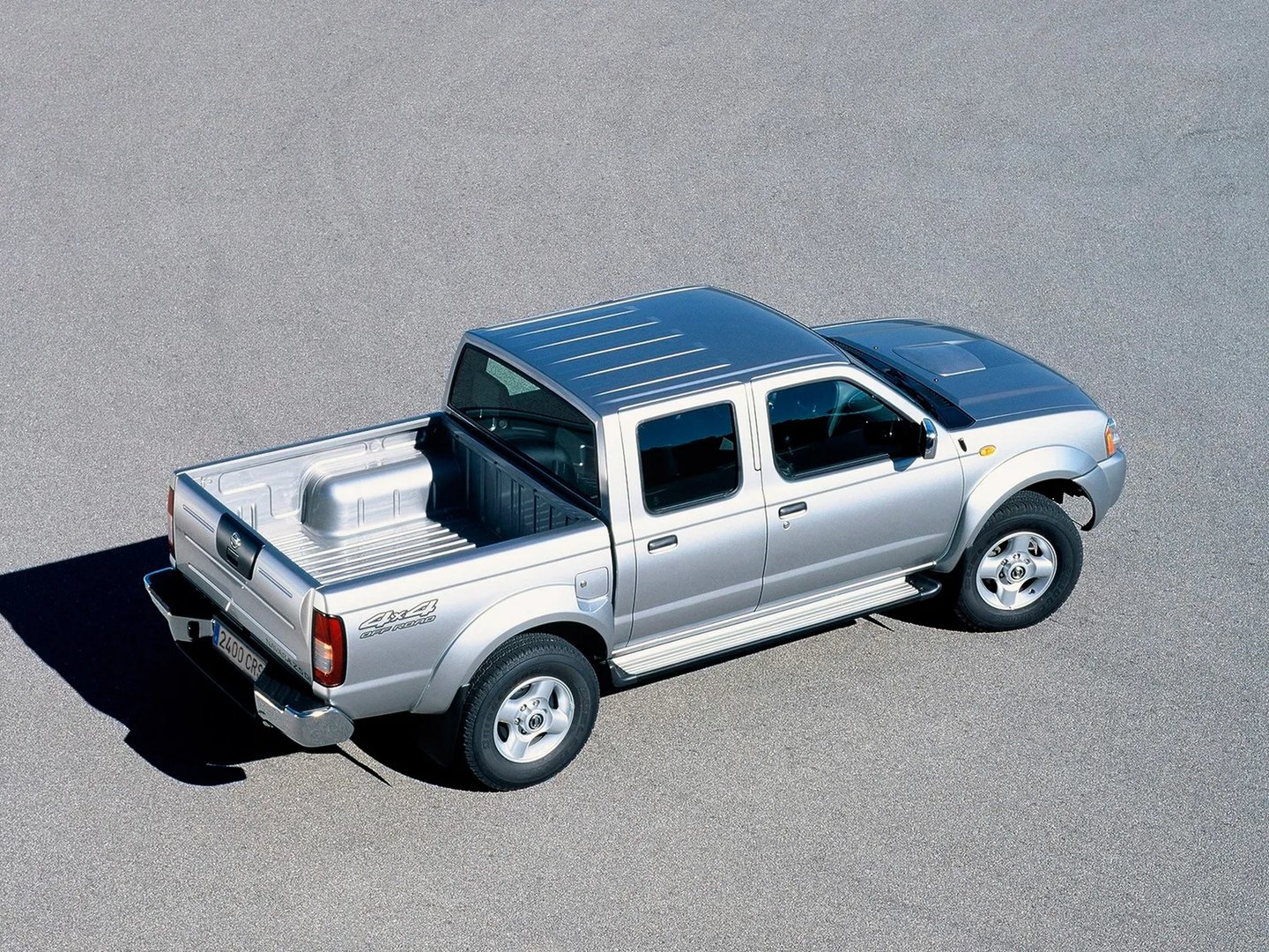 Nissan_Navara_2_generation__Pickup_double-cab__4.jpg