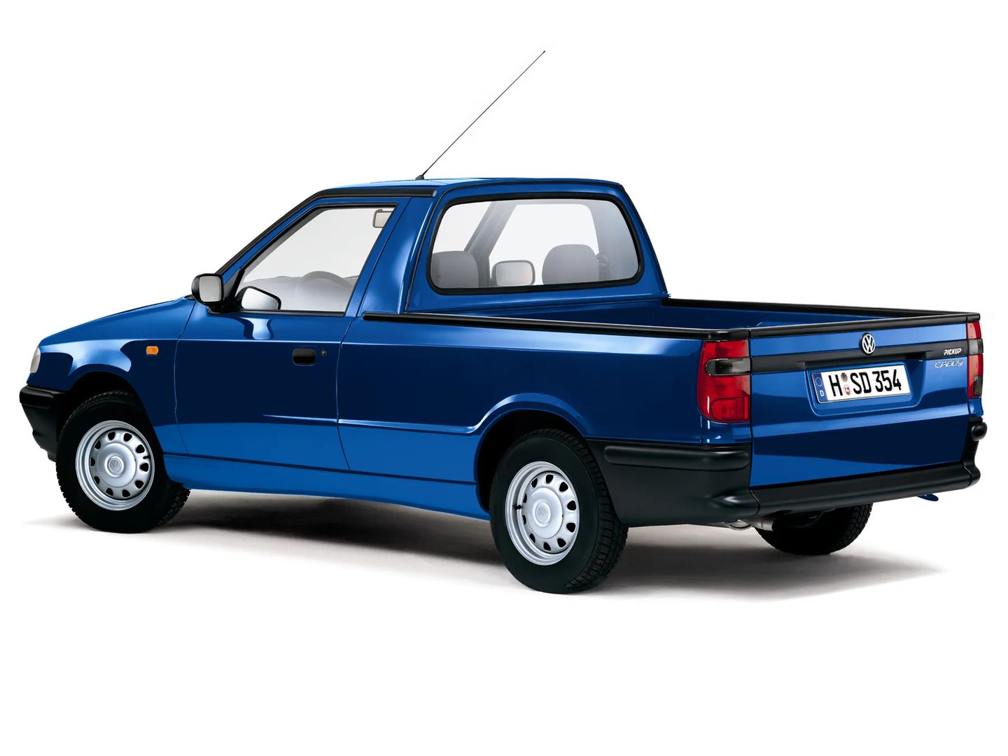 Volkswagen_Caddy_2_generation__Pickup__1.jpg