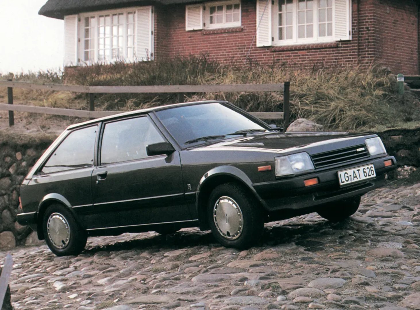 Mazda_323_Lantis_2_generation__Hatchback_3-door__1.jpg