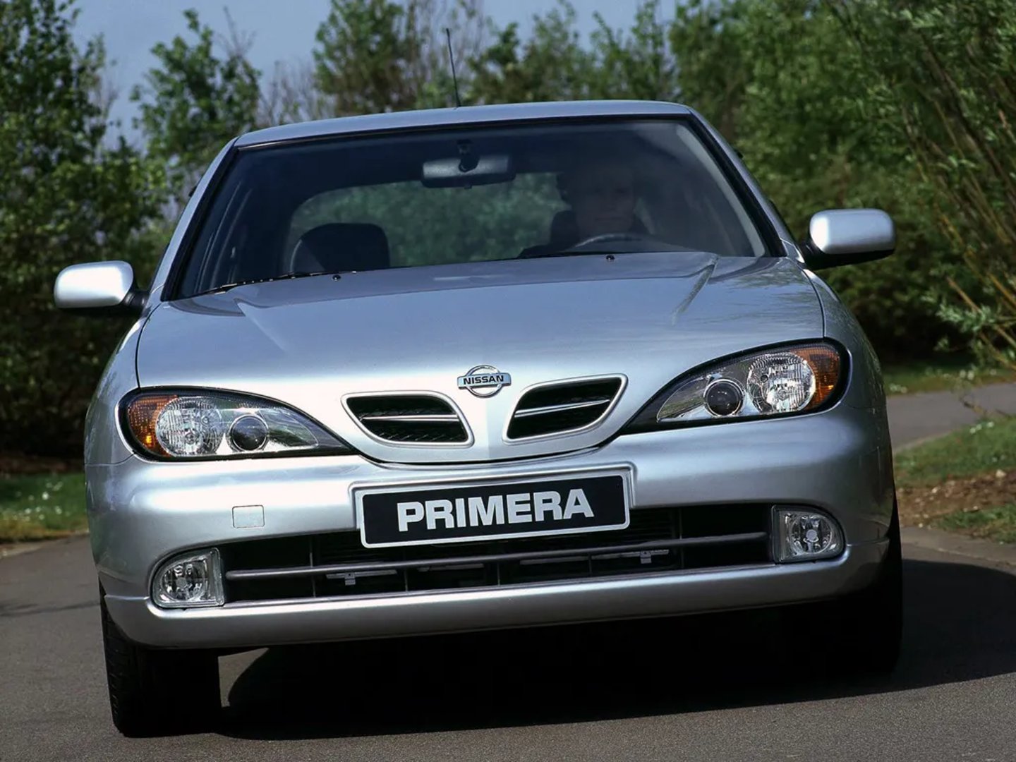 Nissan_Primera_2_generation_restyling__Hatchback_5-door__4.jpg