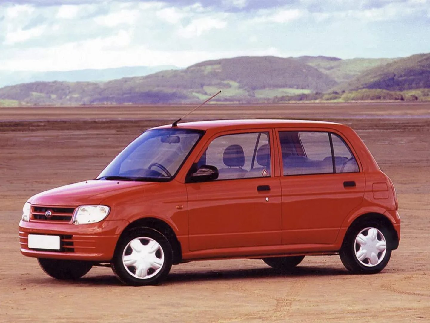 Daihatsu_Cuore_5_generation__Mini_5-doors__1.jpg
