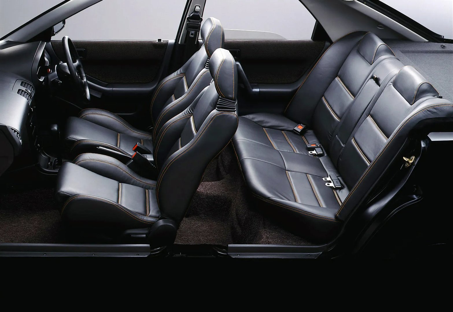 Mazda_Eunos_100_1_generation__Hatchback_5-door__5.jpg