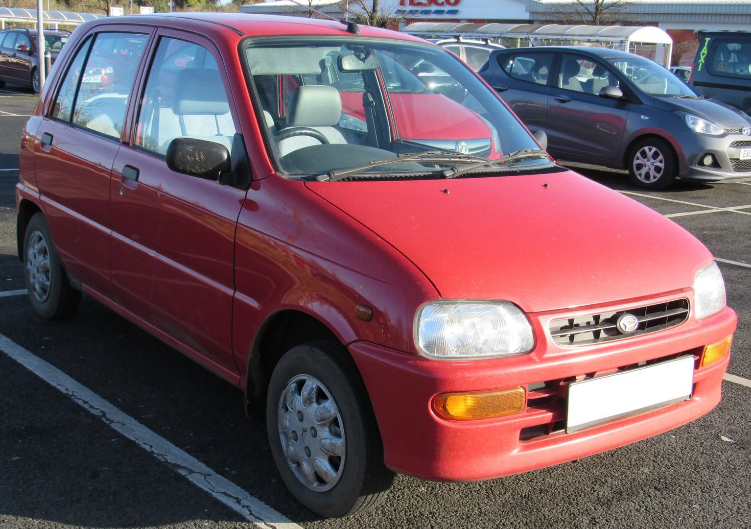 Daihatsu_Cuore_4_generation__Mini_5-doors__1.jpg