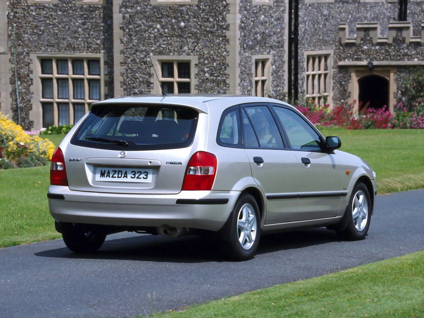 Mazda_323_Lantis_6_generation__Hatchback_5-door__4.jpg