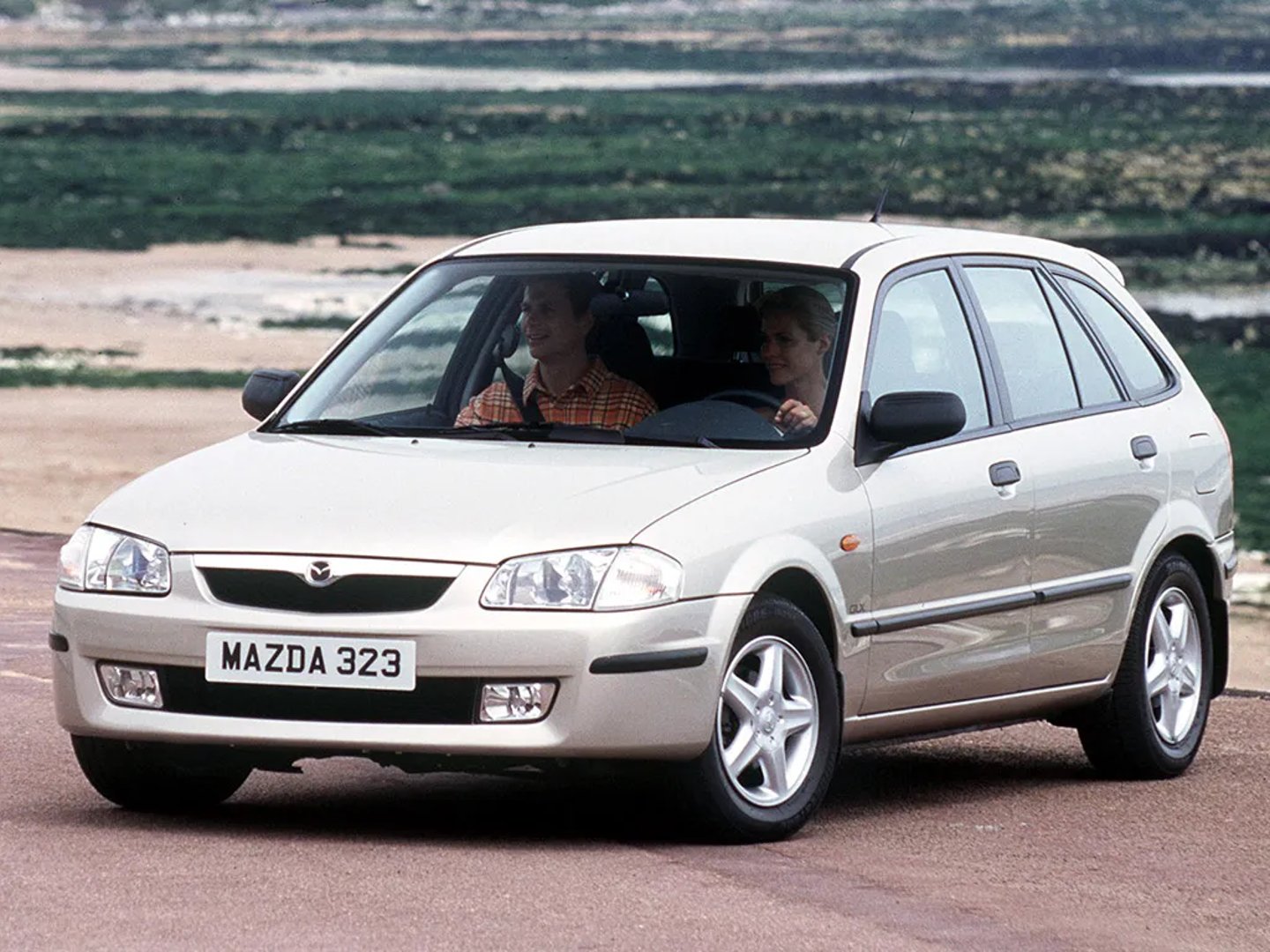 Mazda_323_Lantis_6_generation__Hatchback_5-door__1.jpg