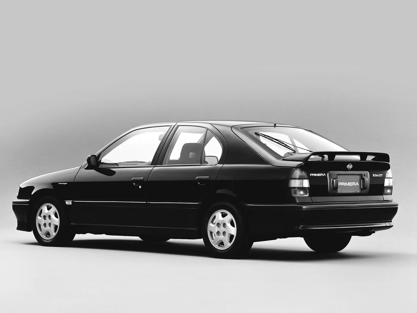 Nissan_Primera_1_generation__Hatchback_5-door__3.jpg