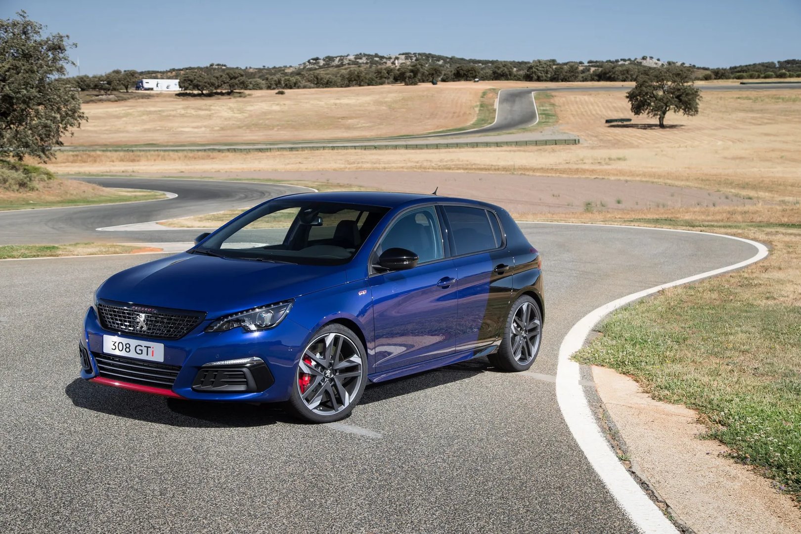 Peugeot_308_GTi_1_generation_restyling__Hatchback_5-door__1.jpg