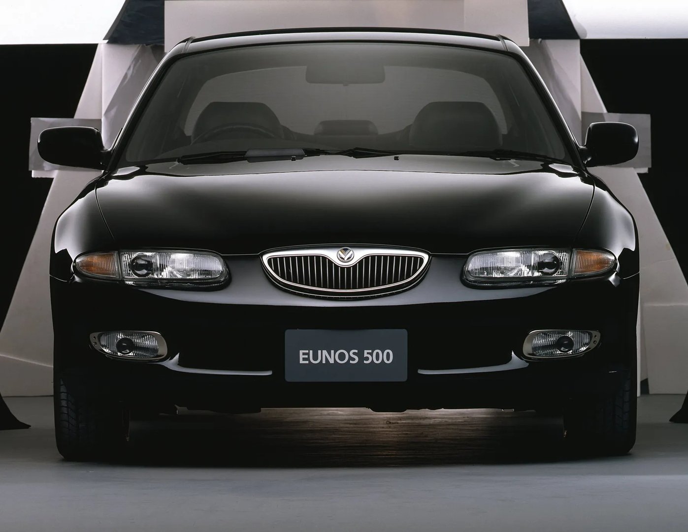 Mazda_Eunos_500_1_generation__Sedan__4.jpg