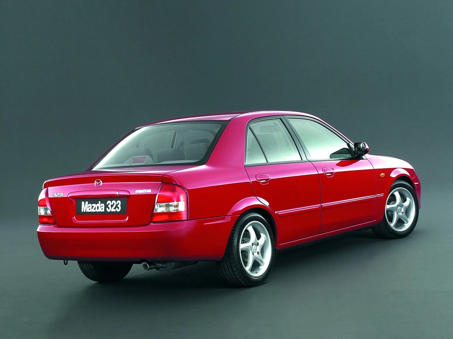Mazda_323_Lantis_6_generation_restyling__Sedan__1.jpg
