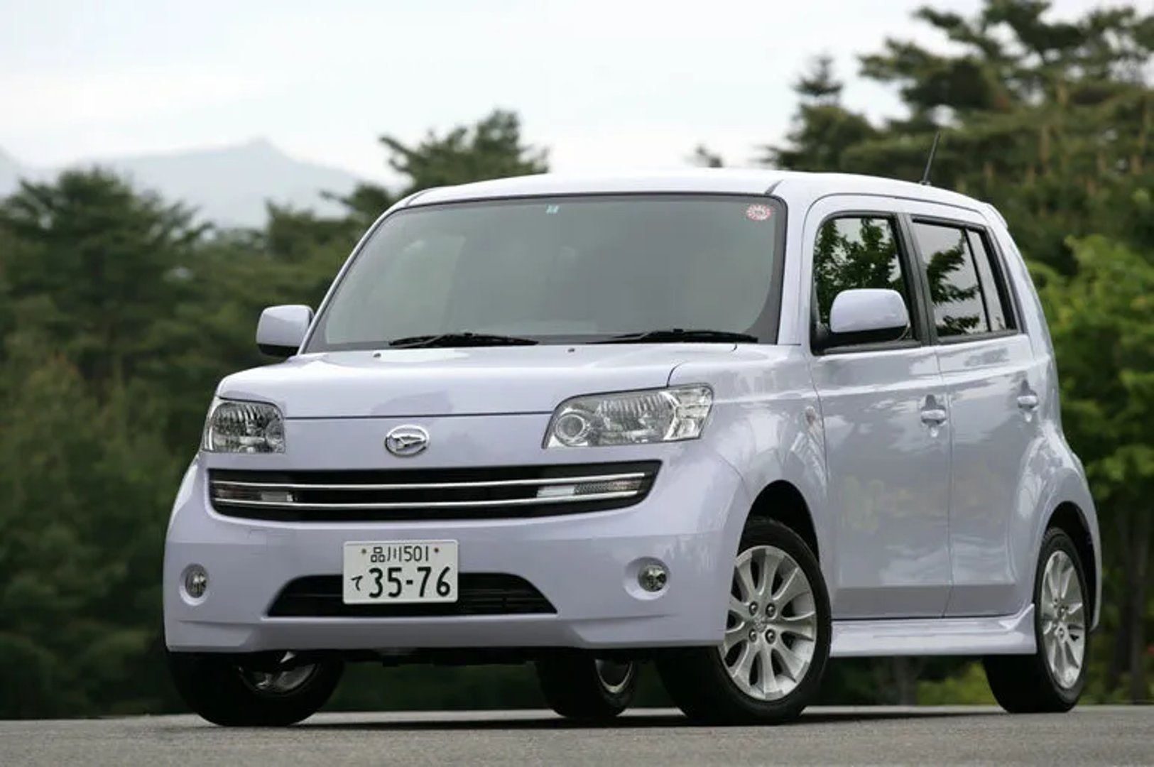 Daihatsu_Coo_1_generation__Microvan__3.jpg