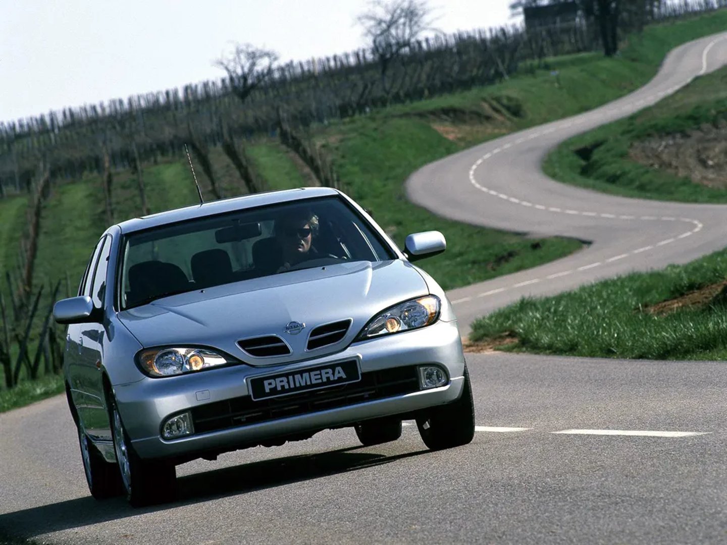 Nissan_Primera_2_generation_restyling__Hatchback_5-door__2.jpg