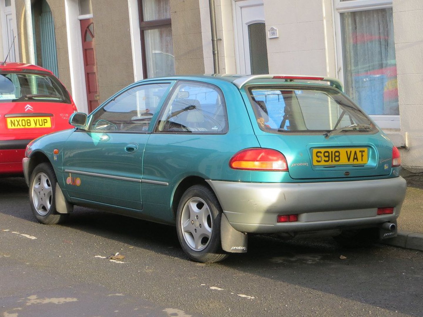 proton_Persona_1_generation__Hatchback_3-door__1.jpg
