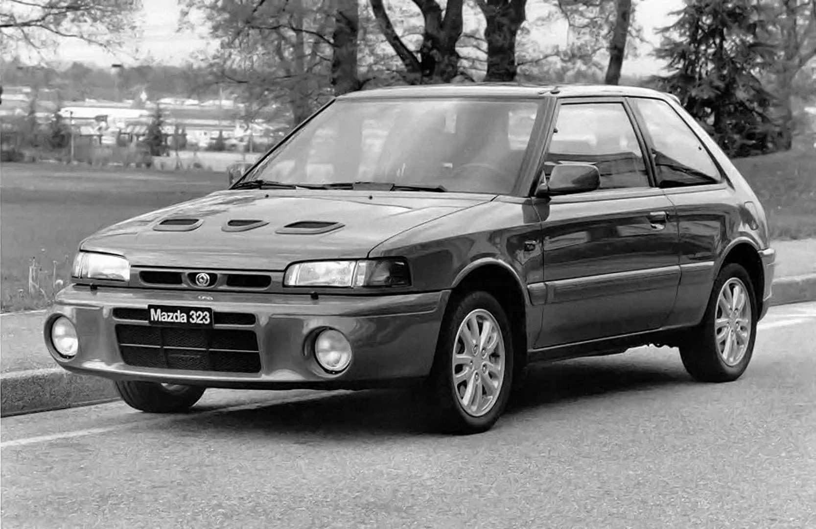 Mazda_323_Lantis_4_generation__Hatchback_3-door__1.jpg