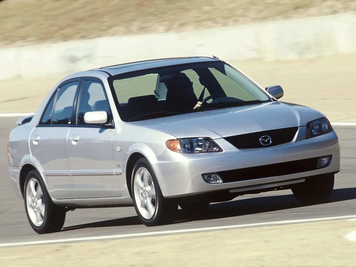 Mazda_Protege_3_generation__Sedan__7.jpg