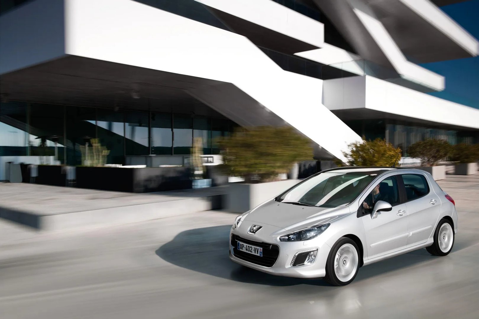 Peugeot_308_1_generation_restyling__Hatchback_5-door__1.jpg