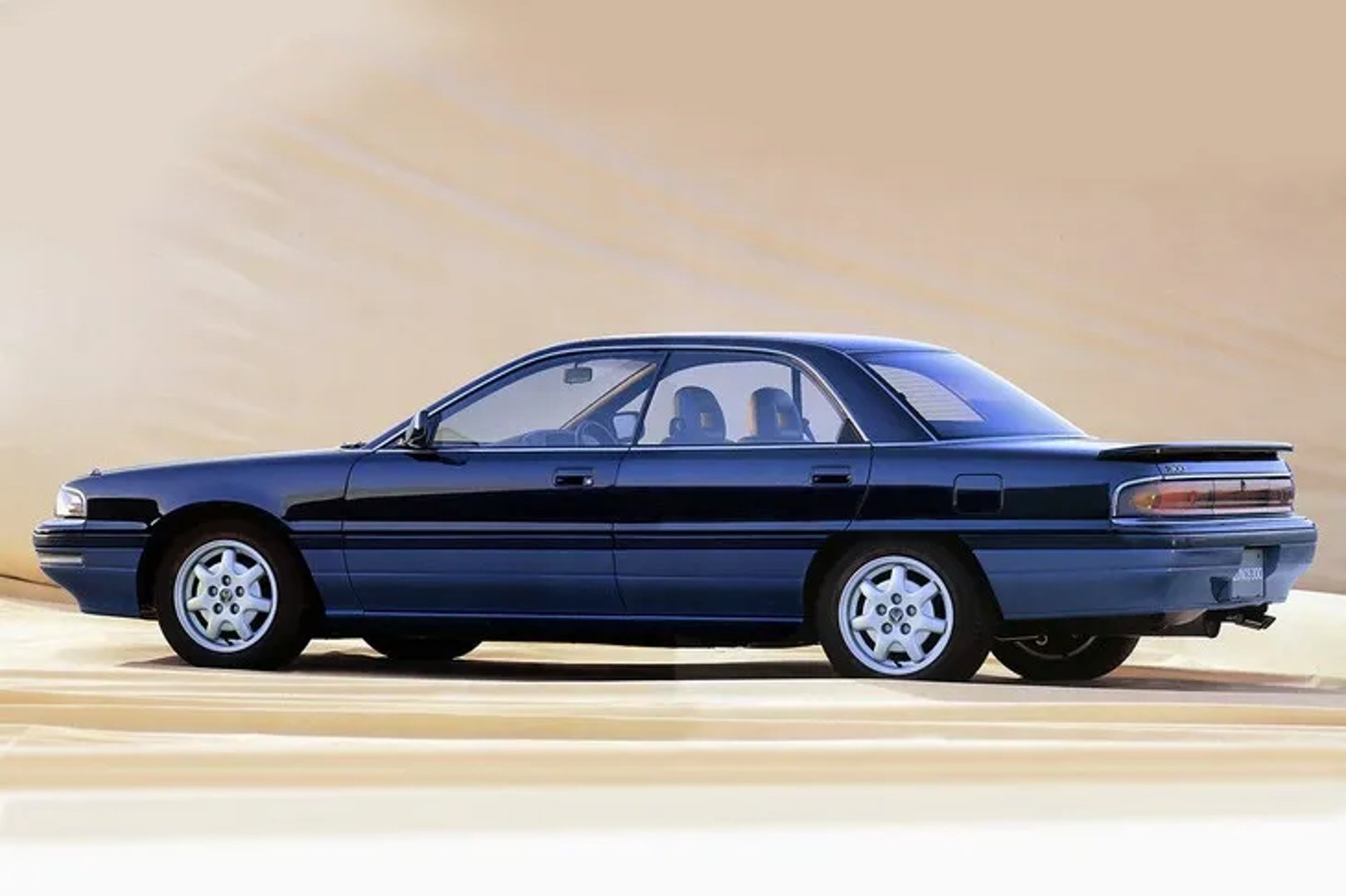 Mazda_Eunos_300_1_generation__Sedan__1.jpg