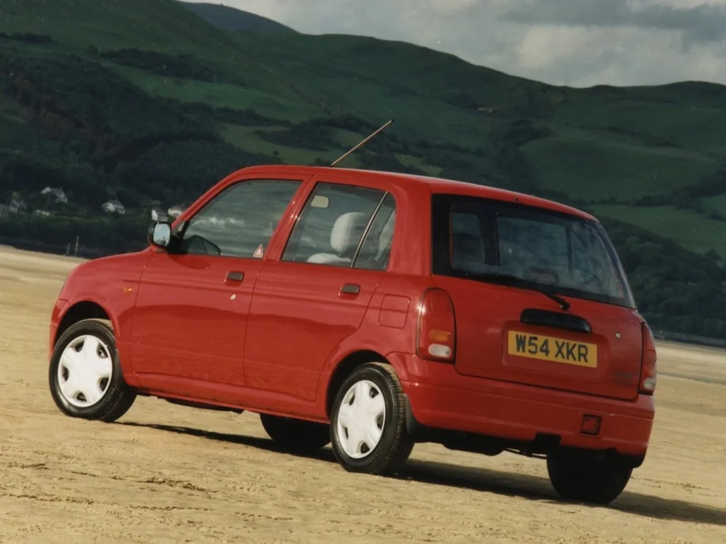 Daihatsu_Cuore_5_generation__Mini_5-doors__2.jpg