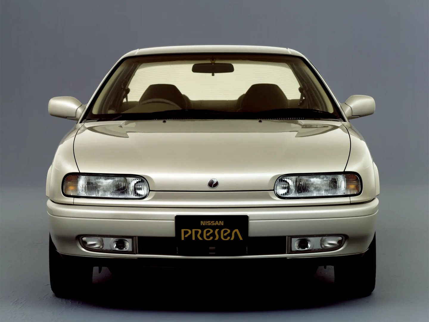 Nissan_Presea_1_generation__Sedan__4.jpg