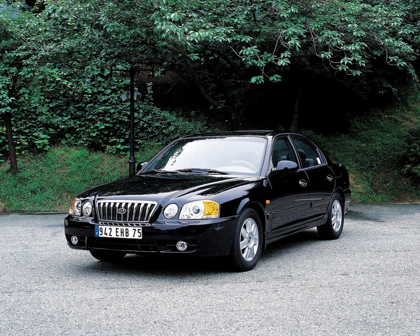 Kia_Magentis_1_generation_restyling__Sedan__4.jpg