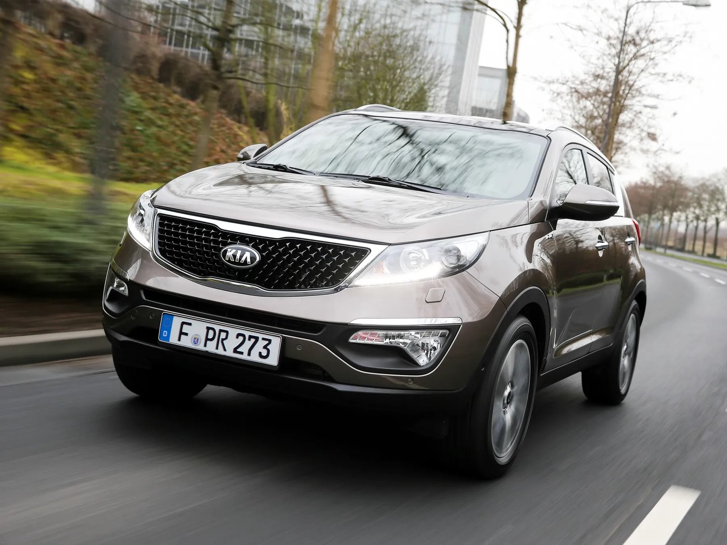 Kia_Sportage_3_generation_restyling__SUV_5-doors__3.jpg
