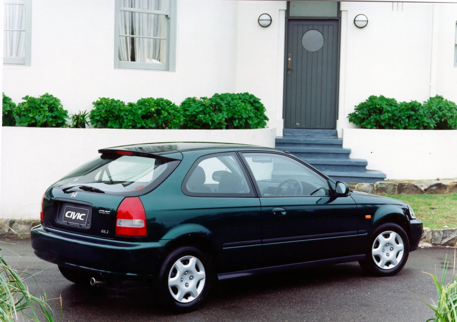 Honda_Civic_(USA)_6_generation_restyling__Hatchback_3-door__1.jpg