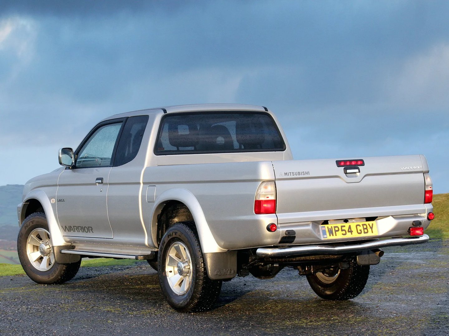 Mitsubishi_L200_3_generation_restyling__Pickup_1.5-cab__1.jpg